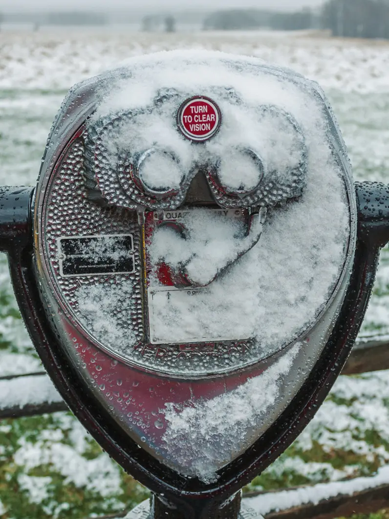 A snow-covered Tower Optical coin-operated binocular viewer