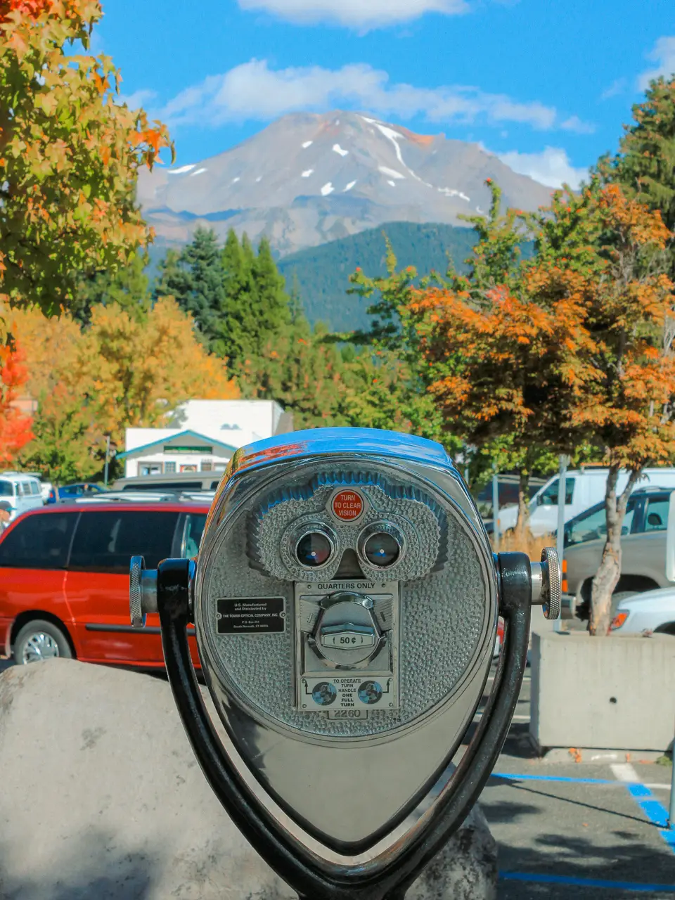 View of a Tower Optical coin-operated binocular viewer looking at a mountain