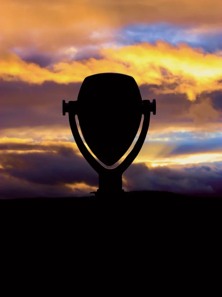 View of Tower Optical Industrial Heavy-Duty Outdoor Binocular Viewer looking at a sunset