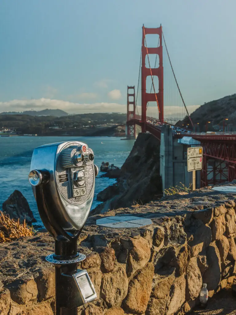 A Tower Optical coin-operated binocular viewer overlooking the Golden Gate Bridge in San Francisco, California. Tour Attraction Binocular Viewer